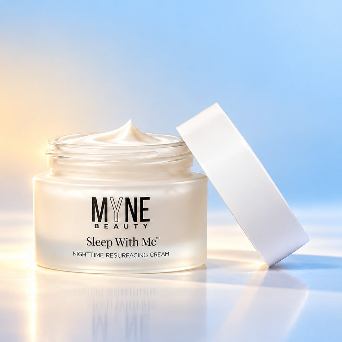 Sleep With Me nighttime resurfacing cream with the lid off in the MYNE atmospheric studio world, t4
